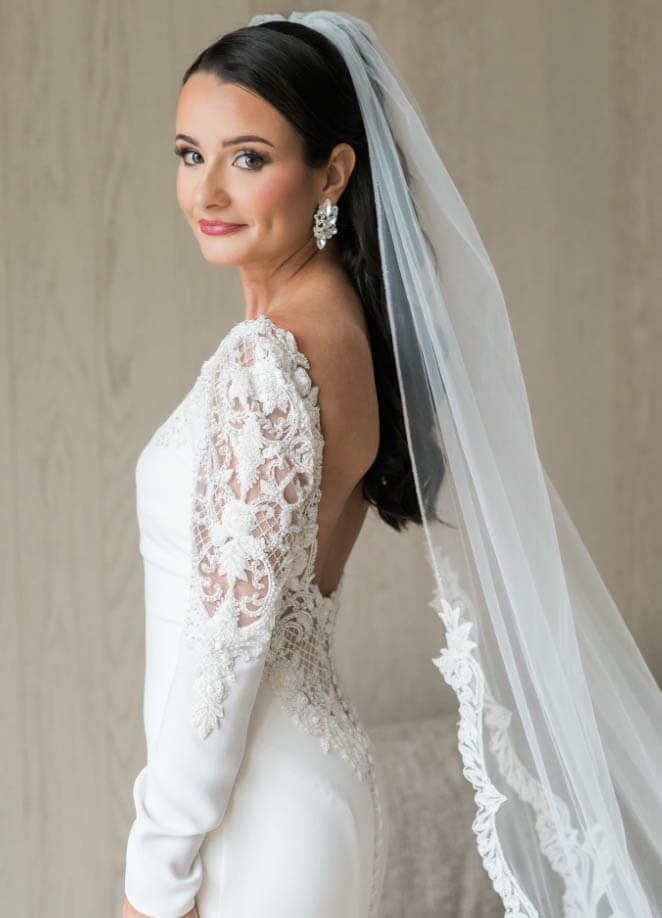 Model wearing a white gown